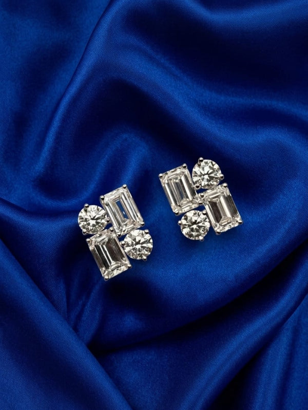 The Diamond Mosaic Studs - mixed-cut cluster stud earrings with emerald-cut and round brilliant diamonds in 18K white gold